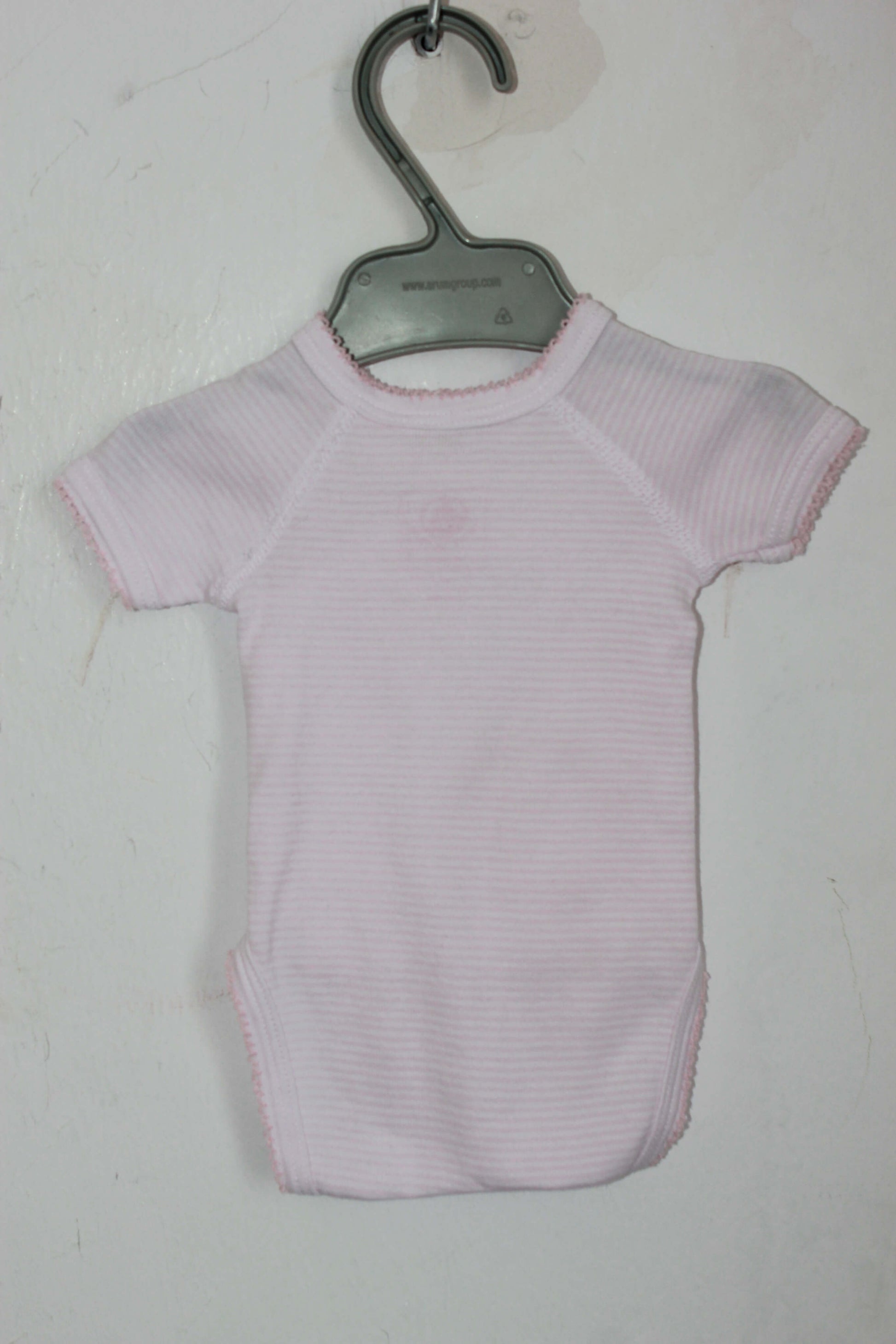 tweedehands roze overslagromper met korte mouwen in maat 46 van petit bateau