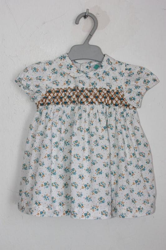 gesmockte katoenen zomerse gebloemde jurk in multicolour met korte mouwen, maat 68 voor een baby meisje van tex