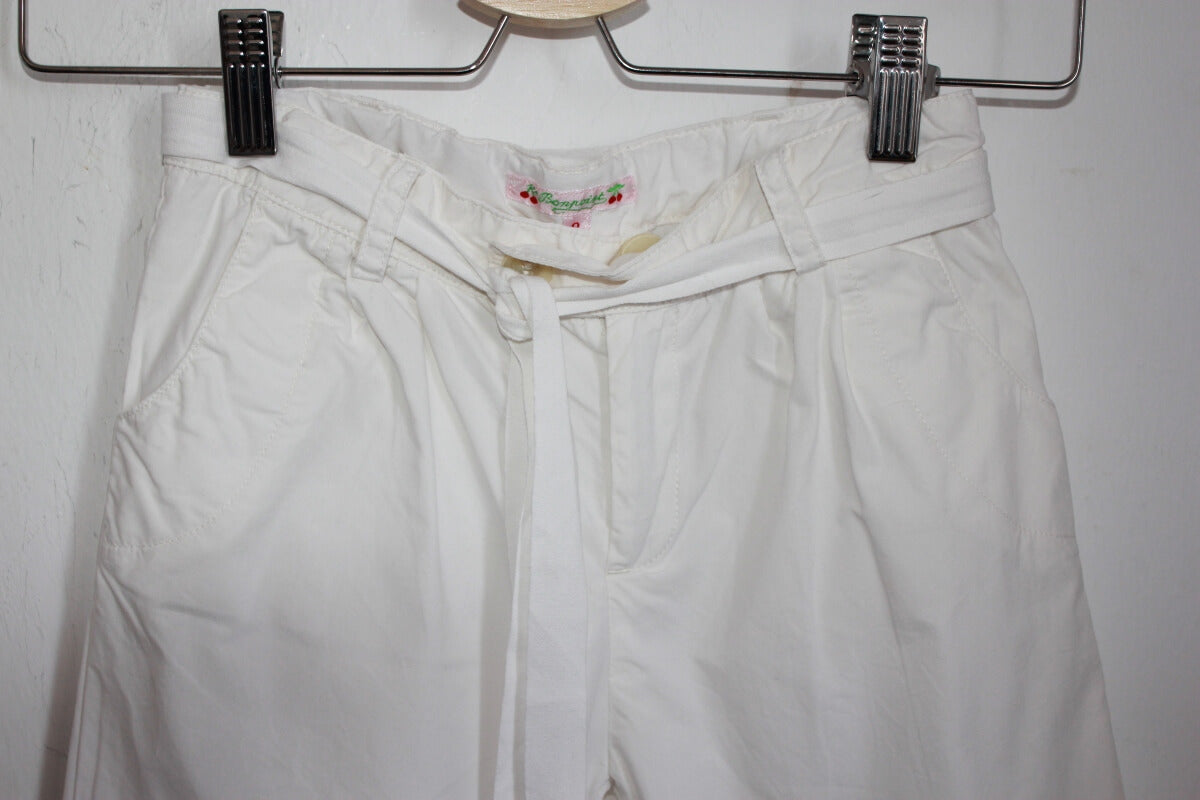 tweedehands katoenen zomerse ecru lange broek van bonpoint, maat 122-128 voor een meisje