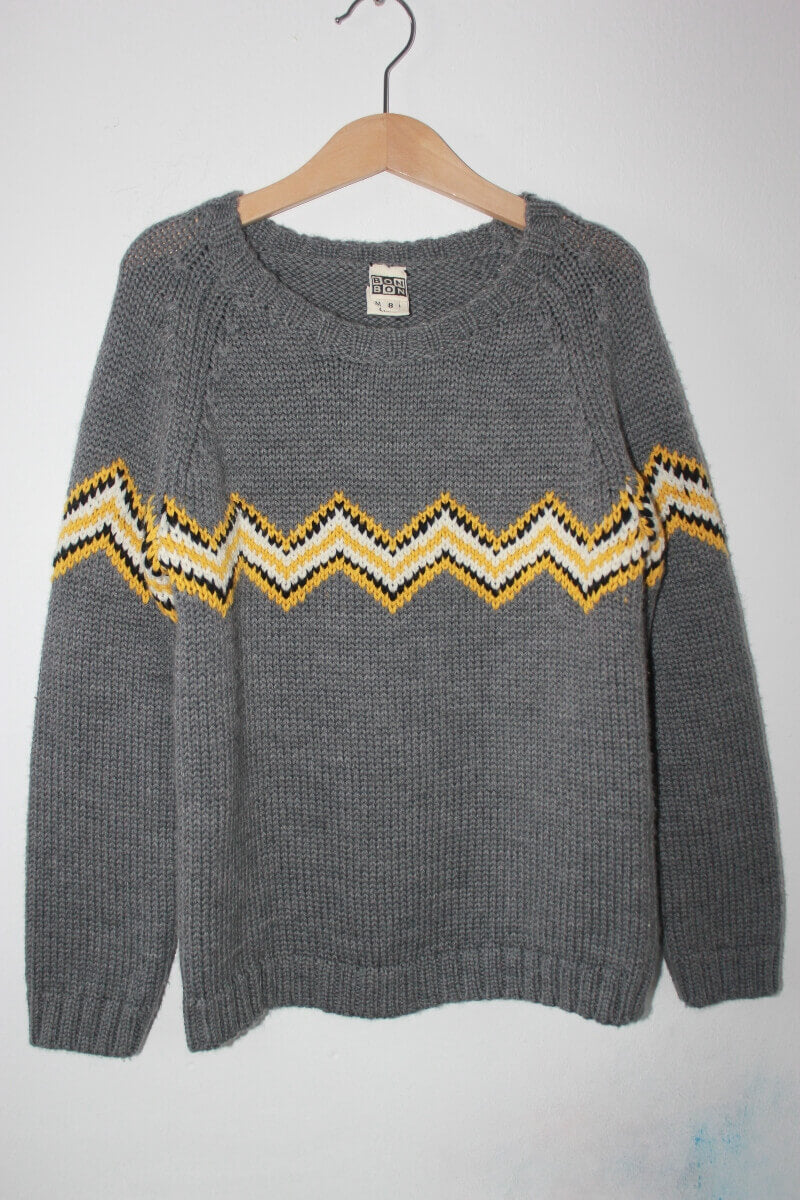 tweedehands unisex wollen warme grijze trui (met geel, ecru en zwart) van bonton maat 122-128