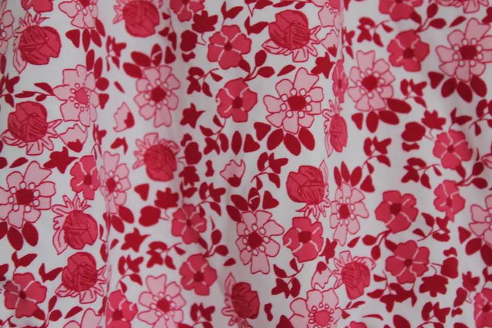 tweedehands roze met wit gebloemd badpak van jacadi in maat 80