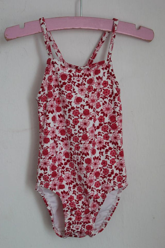 tweedehands roze met wit gebloemd badpak van jacadi in maat 80