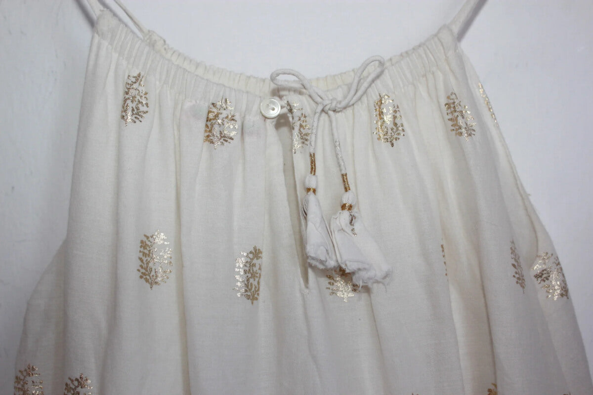 preloved katoenen zomerse jurk met schouderbandjes, creme met goud, van bonpoint in maat 122-128