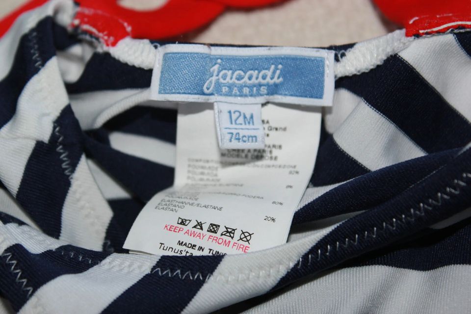 tweedehands donkerblauw met wit en rood gestreept badpak van jacadi in maat 74 voor een baby meisje