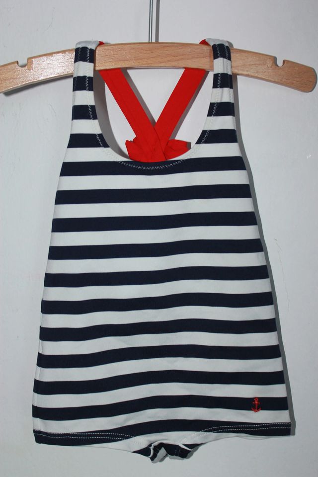 tweedehands donkerblauw met wit en rood gestreept badpak van jacadi in maat 74 voor een baby meisje