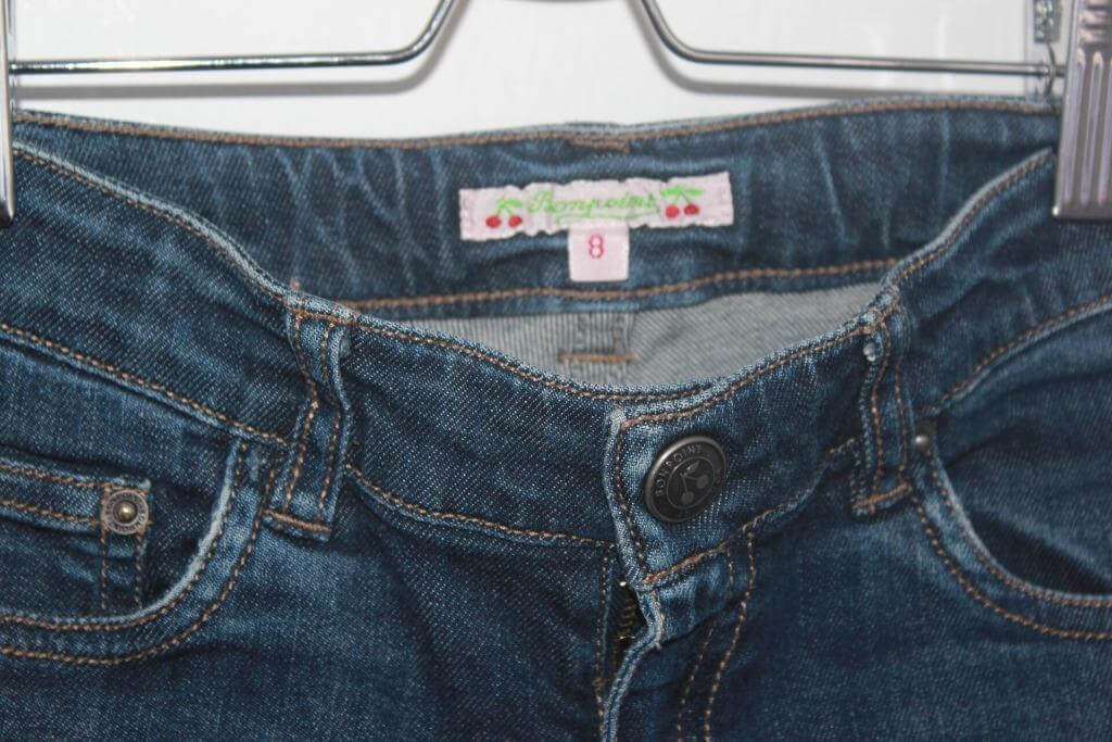 tweedehands donkerblauwe jeans van bonpoint in maat 122-128 voor een meisje
