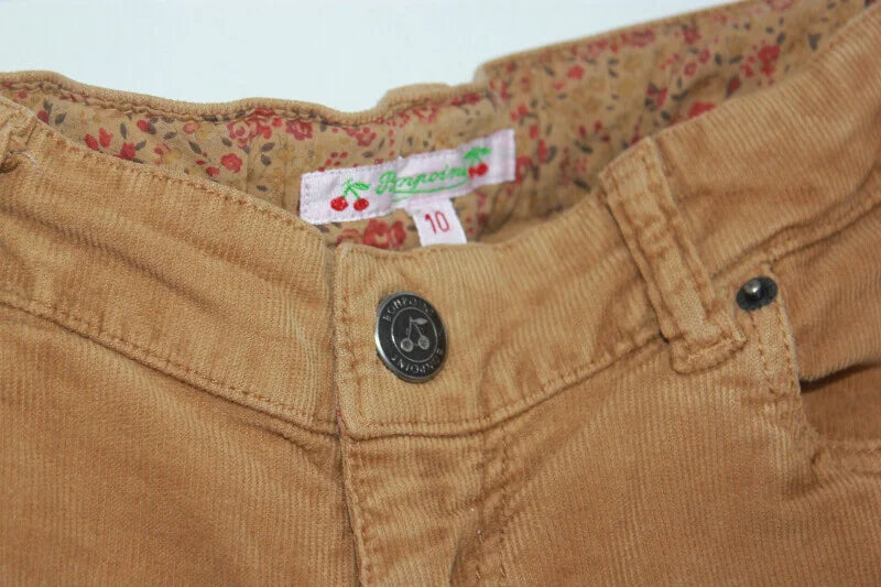 tweedehands ribfluwelen lange broek in de kleur cognac van bonpoint, maat 134-140 voor een meisje