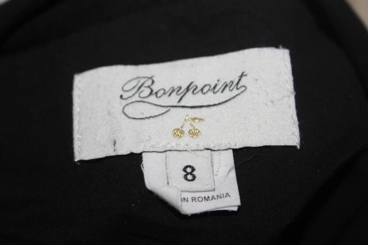 tweedehands zwarte jurk met ecru details en lange mouwen van bonpoint in maat 122-128