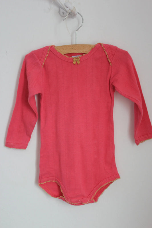 tweedehands-koraalroze-petit-bateau-romper-lange-mouwen-maat-74-baby-meisje