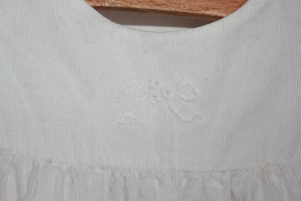 tweedehands-ecru-mouwloze-ribfluwelen-jurk-maat-68-baby-meisje-jacadi