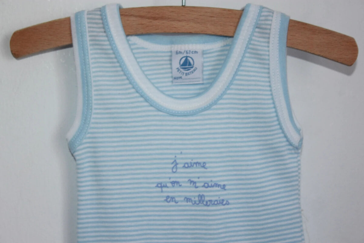 tweedehands-lichtblauw-wit-gestreepte-mouwloze-romper-maat-68-petit-bateau