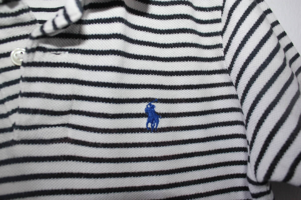 tweedehands-donkerblauw-wit-gestreept-poloshirt-maat-110-ralph-lauren-jongen