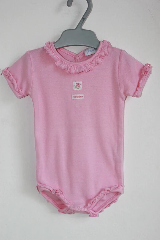 tweedehands katoenen roze romper met korte mouwen van jacadi in maat 68 voor een baby meisje
