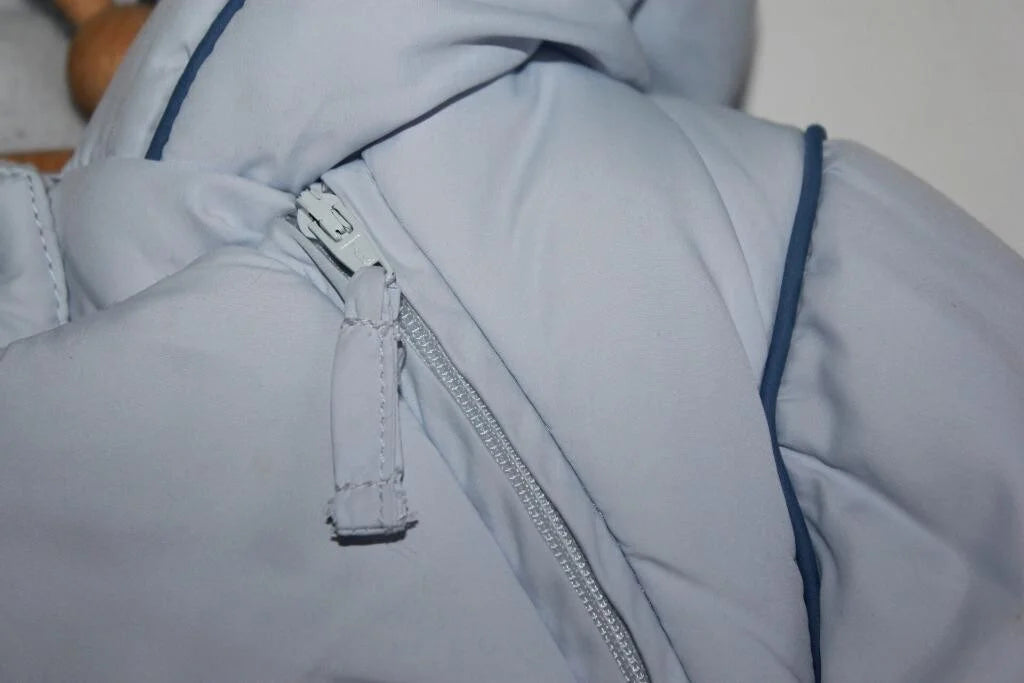 tweedehands unisex lichtblauw jacadi skipak in maat 62 voor een baby 