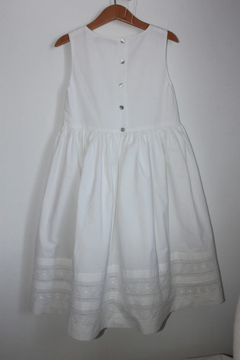 tweedehands-witte-mouwloze-jurk-maat-140-jodhpur-zomercollectie